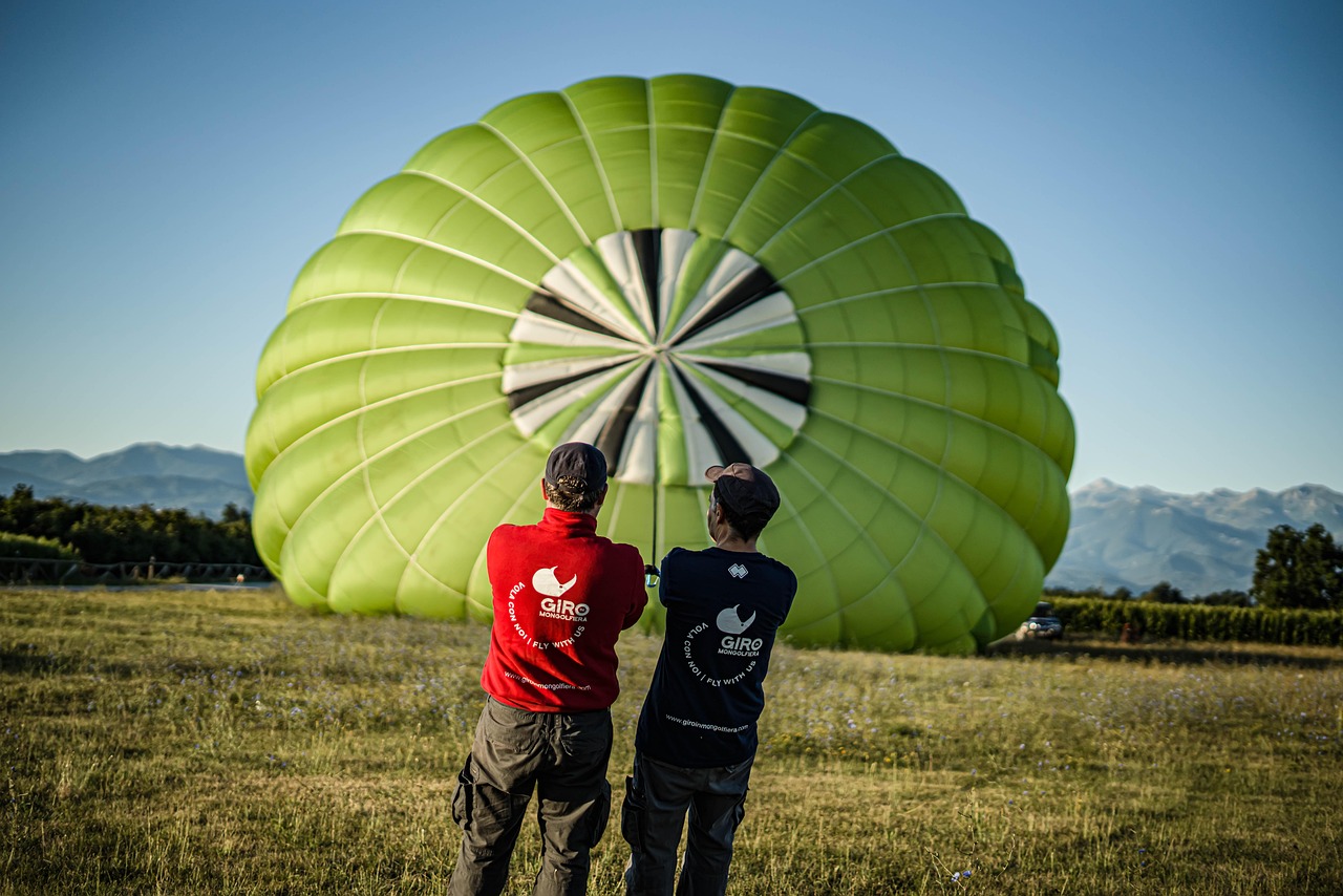 people, pulling, hot air balloon, field, landing, balloon, work, business, meadow, outdoors, people, people, balloon, work, business, business, business, business, business