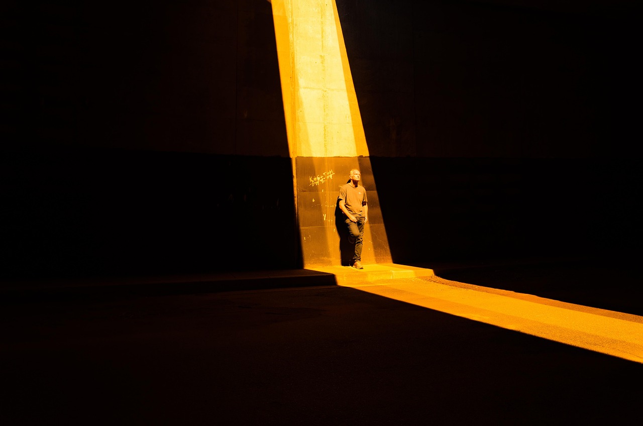 man, light, night, bridge, road, street, dark, man, light, light, light, light, light, night, road, road, street, dark, dark, dark